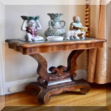 F05. Empire style mahogany game table. 29”h x 33”w x 17” - $350 